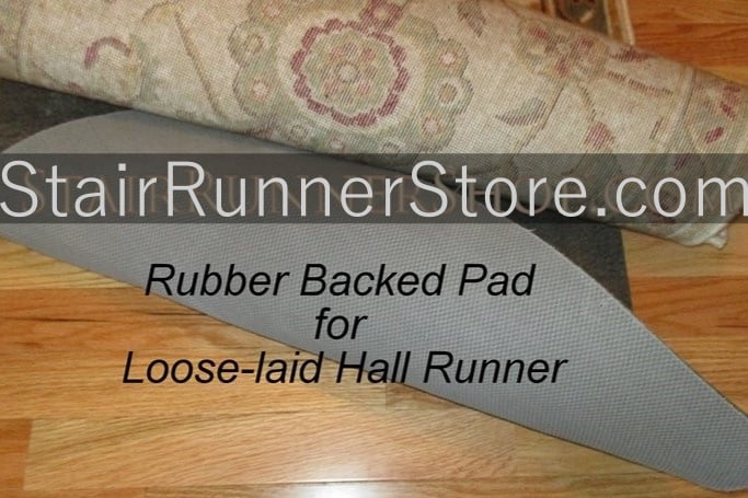 Rubber backed carpet padping for a loose-laid hall runner
